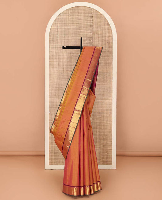 Orange Plain Kanchipuram Silk Saree, Complemented by Contrast Border of Thazampoo Rekku, Muthu and Vanki Designs, Zari Designs Woven Pallu, and Paired with a Contrast Blouse