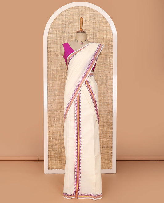 Cream plain Kerala mundu set with contrast striped temple pink border