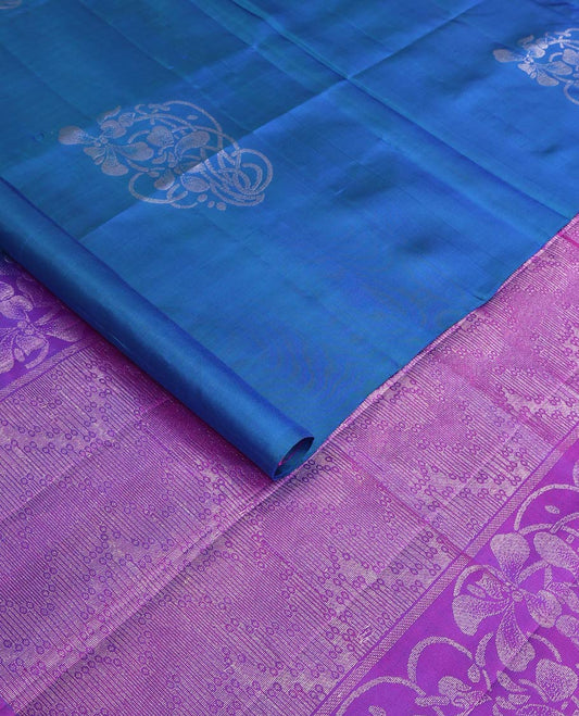 Borderless blue floral buttas woven soft silk saree, contrast pallu of floral and chevron designs