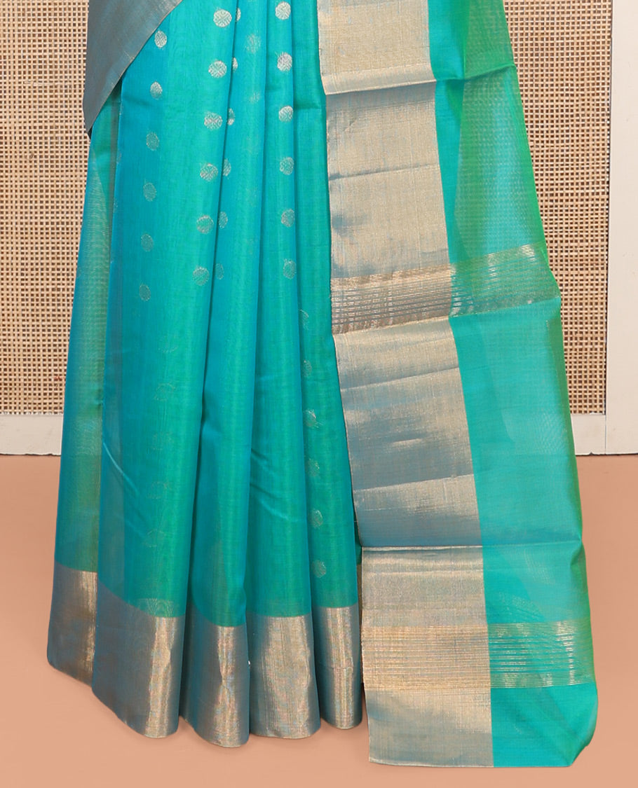 Sea Green Silk Cotton Saree, Adorned with Zari Buttas, Contrast Border, Gleaming Zari Pallu, and a Matching Blouse