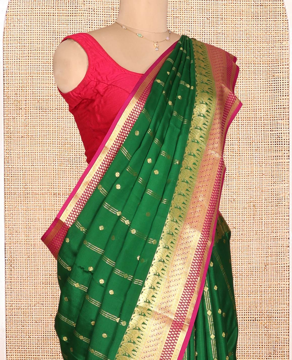 Green Mysore Silk Saree, Artfully Detailed with Zari Buttas and Stripes, a Contrast Traditional Zari Border, Intricately Designed Pallu, and a Contrast Blouse