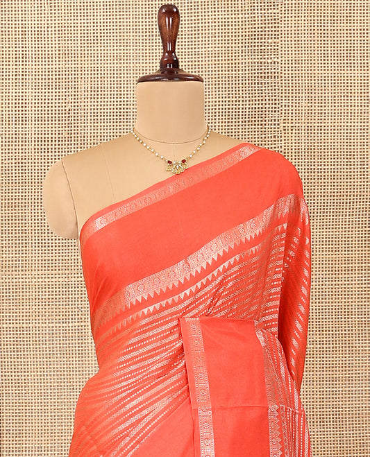 Orange Assam Silk Saree, Beautifully Detailed with Zari Designs All Over Its Body, Highlighted by a Zari Border of Traditional Designs, a Gleaming Pallu of Ogee Patterns, and Paired with a Matching Blouse