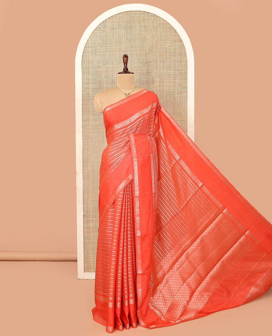 Orange Assam Silk Saree, Beautifully Detailed with Zari Designs All Over Its Body, Highlighted by a Zari Border of Traditional Designs, a Gleaming Pallu of Ogee Patterns, and Paired with a Matching Blouse