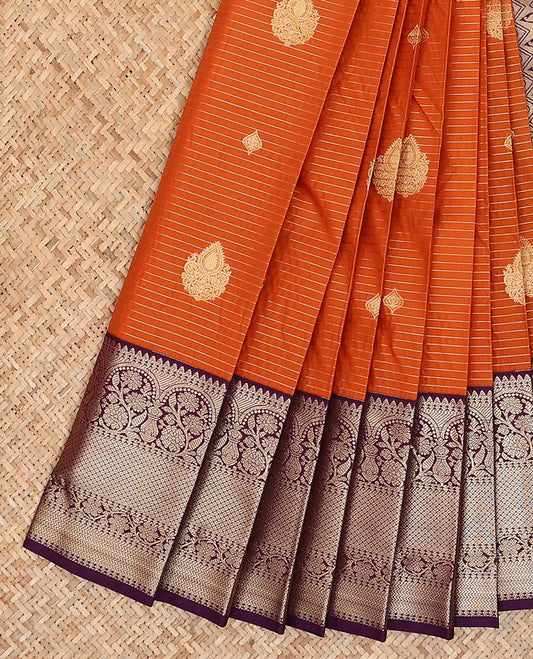 Orange zari striped and buttas gift saree, contrast traditional design border, and pallu of chevron and paisley designs