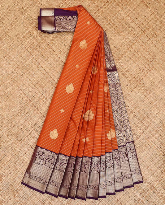 Orange zari striped and buttas gift saree, contrast traditional design border, and pallu of chevron and paisley designs
