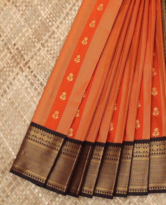 Rust orange zari buttas budget silk saree, contrast traditional zari temple border, and zari-rich jaal pallu