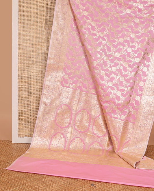 Pink floral jacquard semi banaras satin, self-border of floral creeper designs & pallu of mughal-style floral designs