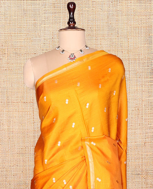 Orange Satin Silk Saree, Finely Crafted with Buttas, a Subtle Piping Border, Complemented by a Contrast Floral-Paisley Jaal Pallu, and a Contrast Blouse