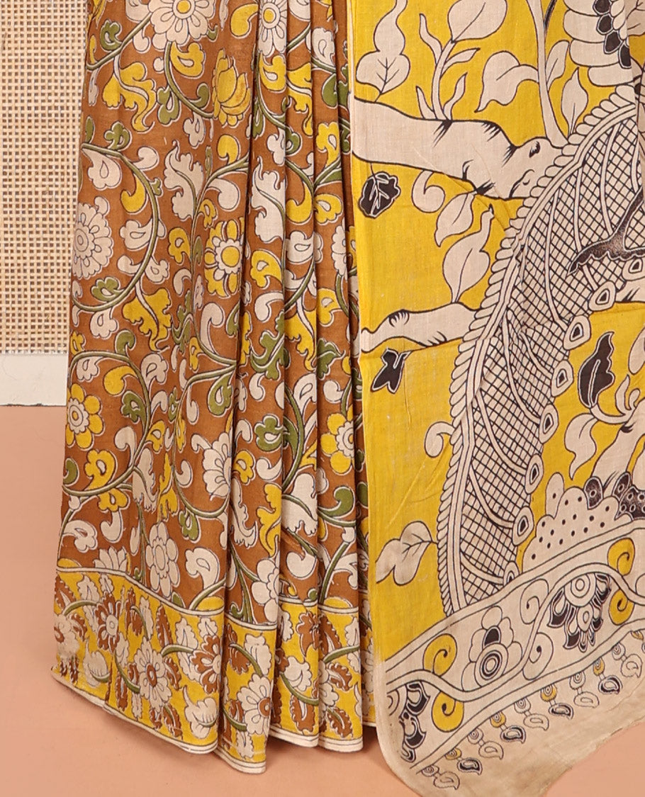 Mustard Machine-Printed Kalamkari Cotton Saree Features Floral Jaal Design, Floral Printed Border, Pallu of Fauna Design, and a Contrast Blouse