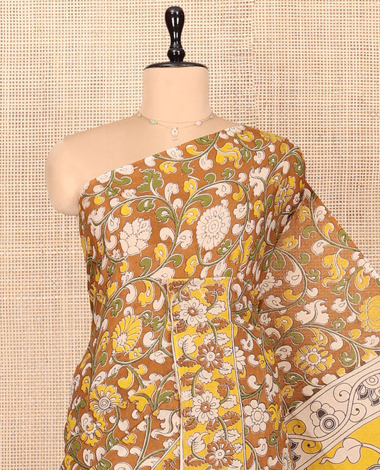 Mustard Machine-Printed Kalamkari Cotton Saree Features Floral Jaal Design, Floral Printed Border, Pallu of Fauna Design, and a Contrast Blouse