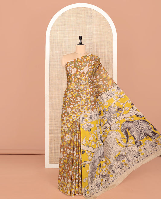Mustard Machine-Printed Kalamkari Cotton Saree Features Floral Jaal Design, Floral Printed Border, Pallu of Fauna Design, and a Contrast Blouse