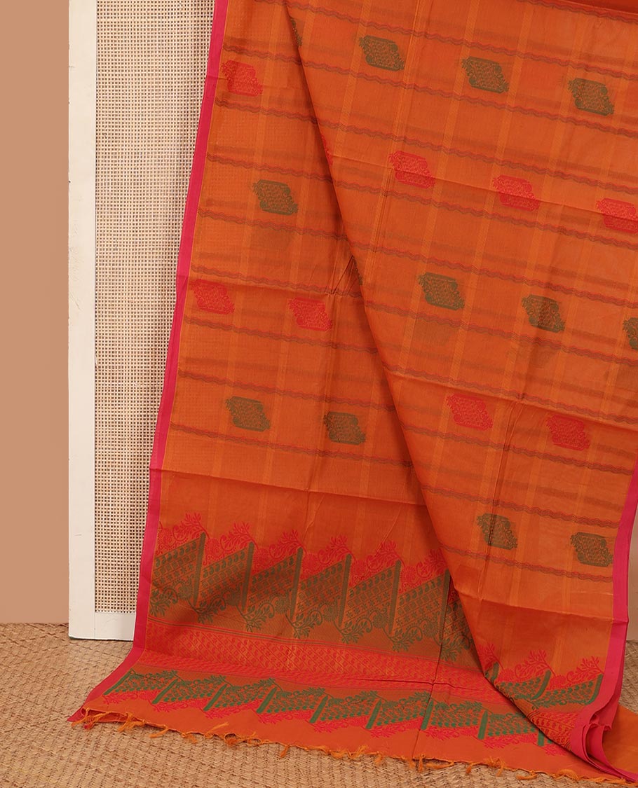 Borderless orange buttas enclosed checked Kanchi cotton saree, self-pallu of floral, and paisley designs