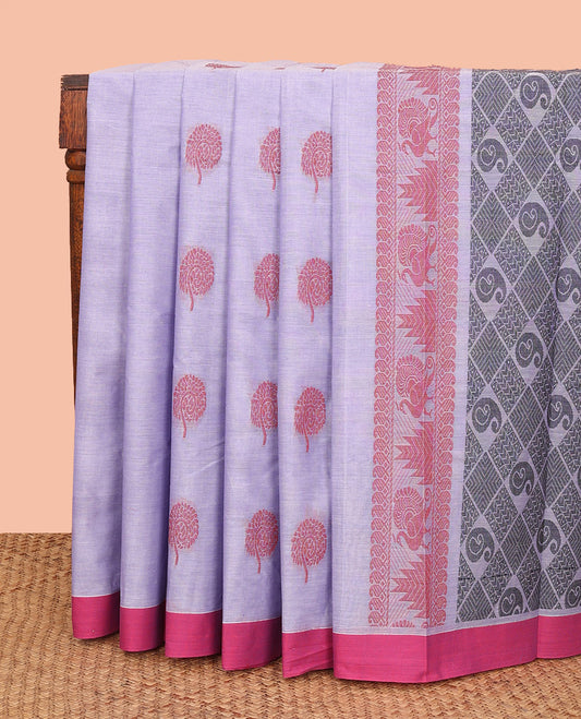 Lavender Kanchi Cotton Saree, Embellished with Floral Buttas All Over Its Body, Complemented by a Contrast Border, Pallu Features Geometric and Paisley Patterns, and Paired with a Matching Blouse
