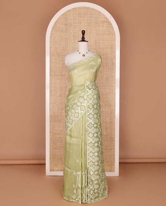 Tea green flower motifs, thread, and sequins embroidered designer saree, floral and geometric thread embroidered scallop border