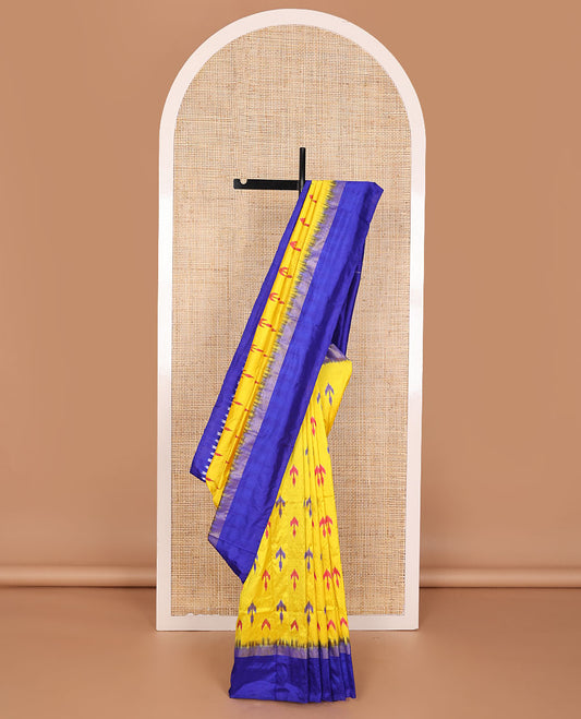 Yellow ikkat buttas ikkat saree, contrast ikkat floral border & pallu of ikkat argyle designs