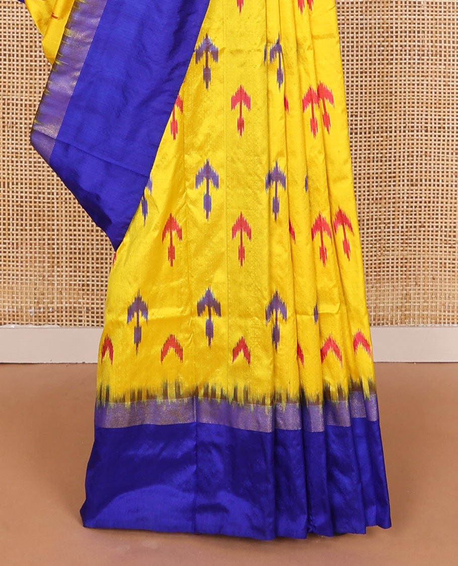 Yellow ikkat buttas ikkat saree, contrast ikkat floral border & pallu of ikkat argyle designs