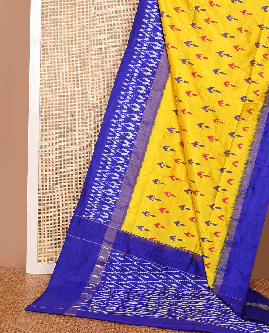 Yellow ikkat buttas ikkat saree, contrast ikkat floral border & pallu of ikkat argyle designs