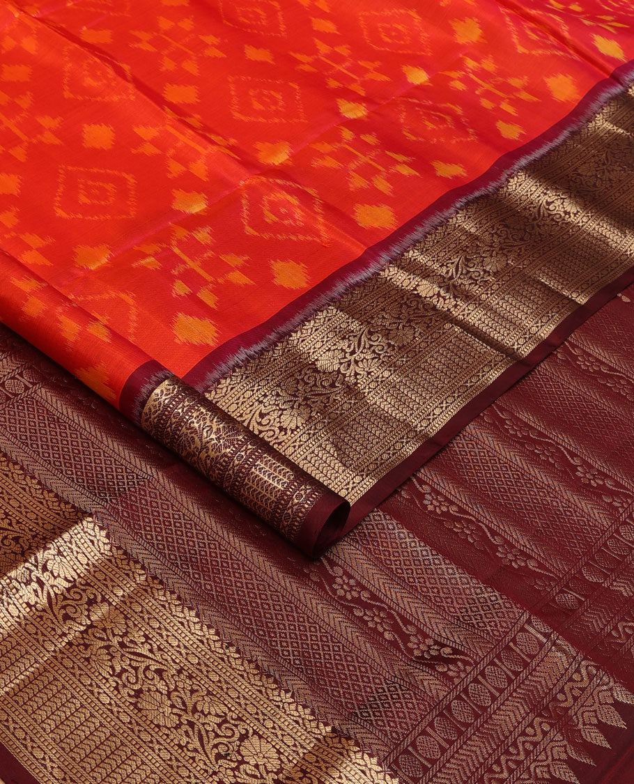Orange jaal-patterned pure ikkat saree, contrast traditional zari kanchi border & pallu of zari geometric designs
