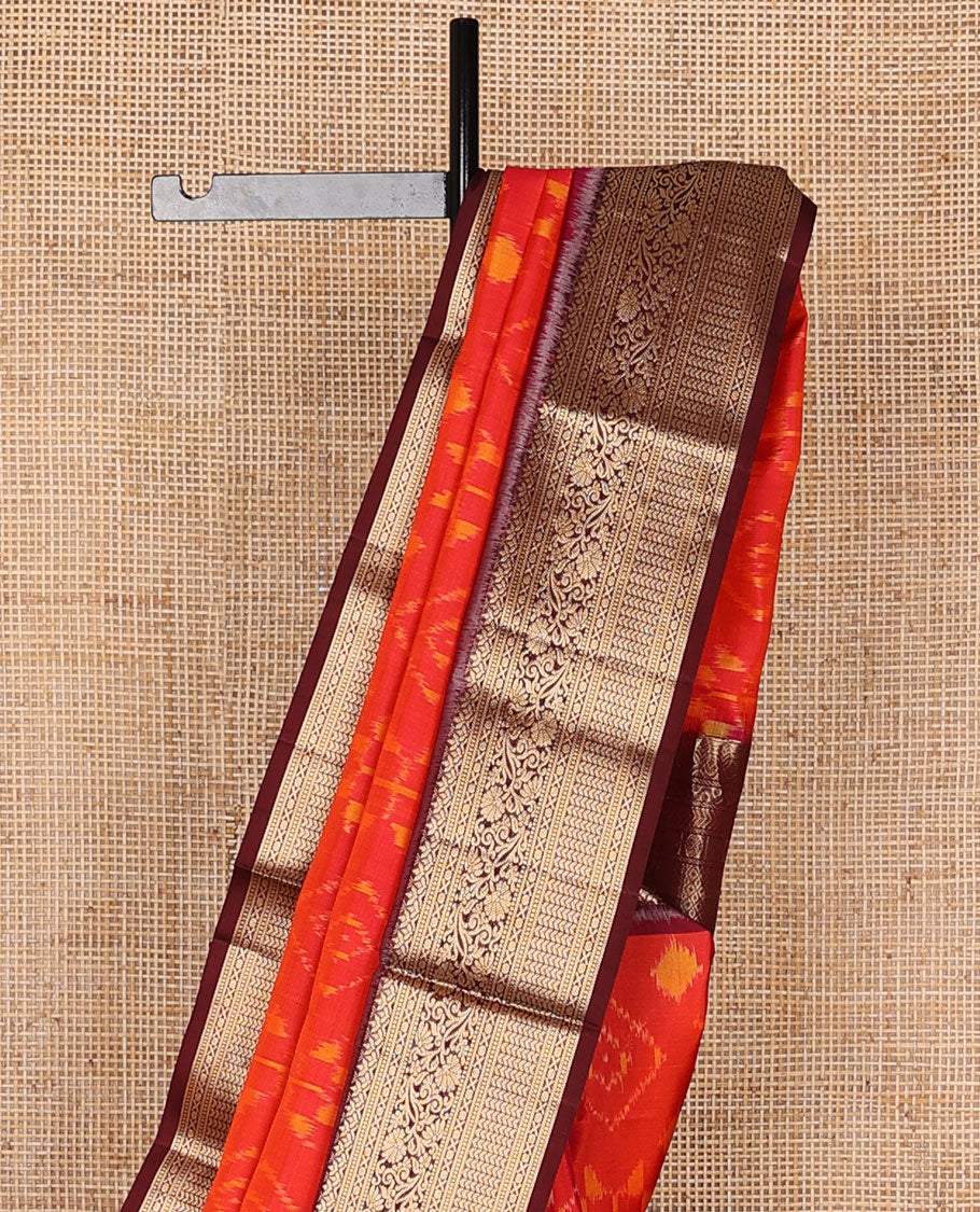 Orange jaal-patterned pure ikkat saree, contrast traditional zari kanchi border & pallu of zari geometric designs