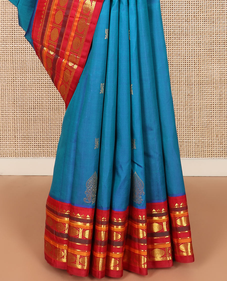 Blue zari buttas Kanchipuram silk saree, contrast border of rekku, muthu, kathir,  rudraksham, and banaras designs, and horse chariot design woven pallu