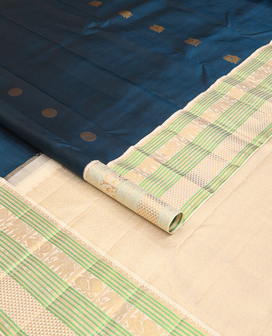 Blue mayil chakram buttas Kanchipuram silk saree, contrast border of banaras,lavangam, yaanai, mayil, and chevron design pallu