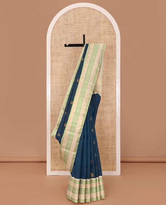 Blue mayil chakram buttas Kanchipuram silk saree, contrast border of banaras,lavangam, yaanai, mayil, and chevron design pallu