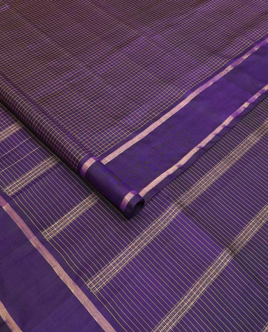 Blue zari micro-checked Kanchipuram silk saree, rettai pettu zari striped border, and zari design pallu