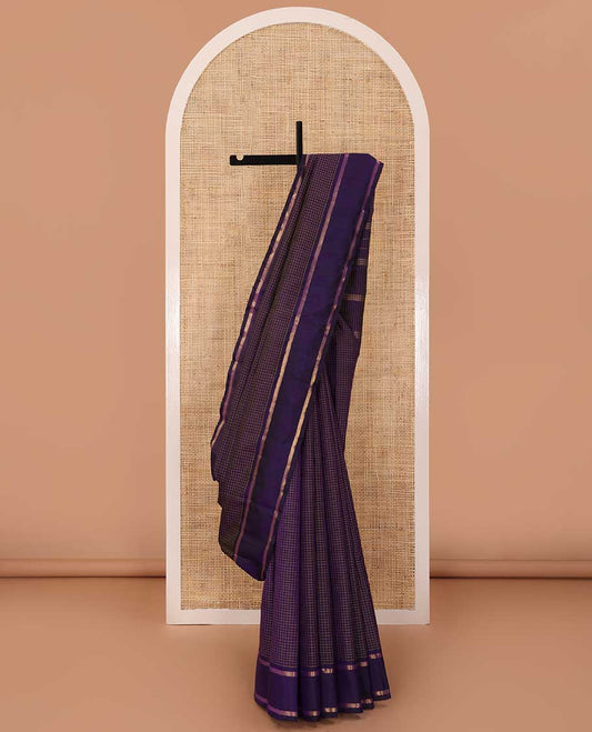 Blue zari micro-checked Kanchipuram silk saree, rettai pettu zari striped border, and zari design pallu