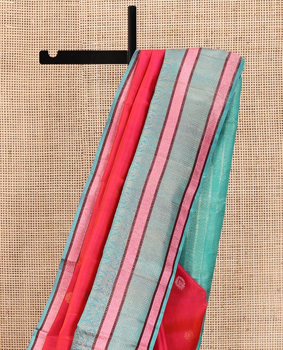 Red Kanchipuram Designer Silk Saree, Subtly Adorned with Buttas All Over Its Body, Complemented by a Captivating Contrast Border of Mughal-Style Designs, Geometric-Patterned Zari-Woven Pallu, and Paired with a Contrast Blouse