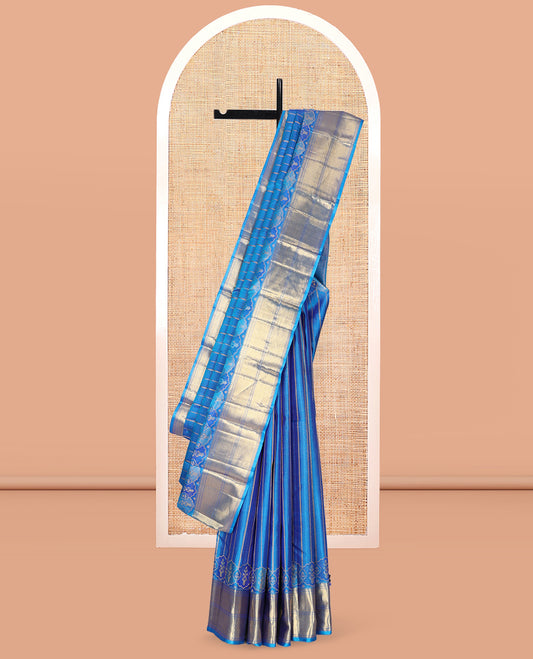 Blue Kanchipuram Designer Silk Saree, Gleamed Up with Zari Stripes, a Zari Border of Thilakam Mokku, Muthu, Rettai Neli, and Kuyil Kann Designs, Intricate Pallu, and a Matching Blouse