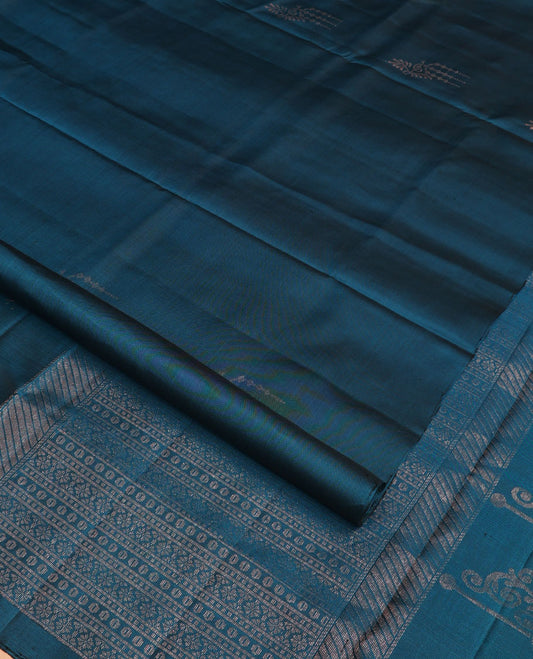 Borderless blue zari buttas soft silk saree, zari-rich pallu steeped with traditional zari designs