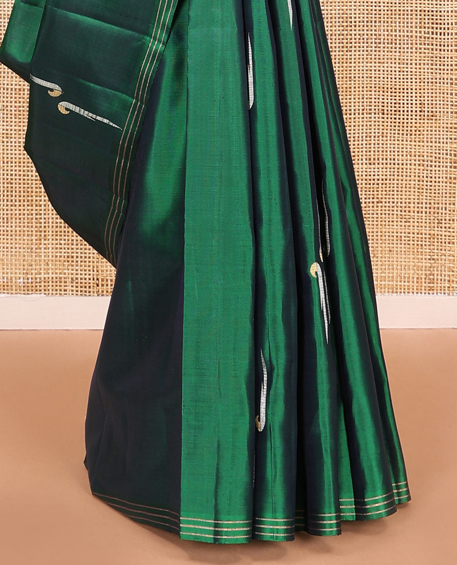 Green muniya buttas soft silk saree, zari striped border, and rudraksham motifs pallu