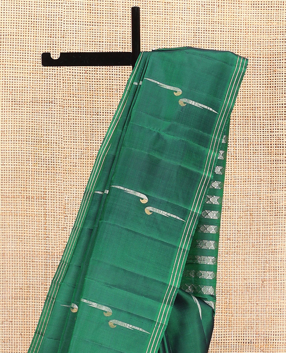 Green muniya buttas soft silk saree, zari striped border, and rudraksham motifs pallu