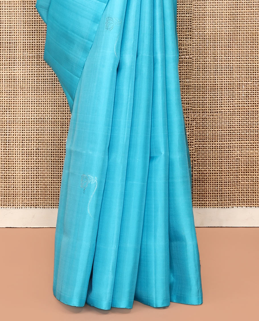Borderless Blue Mayuri Soft Silk Saree, Beautified with Zari Buttas All Over Its Body, Sparsely Woven Pallu of Jaal and Floral Designs, and Paired with a Matching Blouse