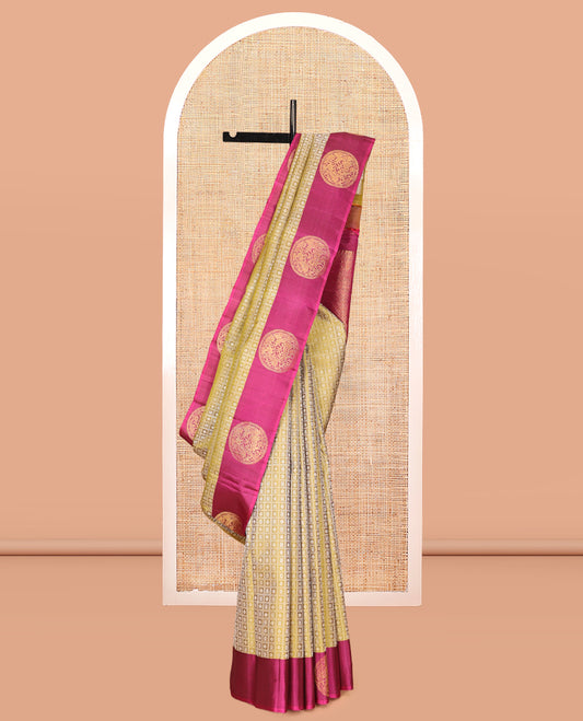 Green Embossed Parambara Silk Saree, a Contrast Border of Chakram Designs, Grand Pallu of Jaal Design, and Contrast Blouse