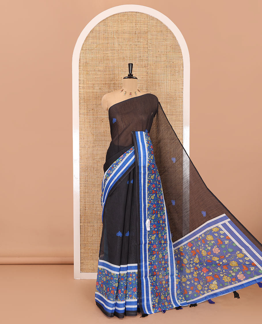 Black floral motifs printed linen cotton saree with contrast kalamkari floral vine printed border, floral vine printed pallu, and a plain blouse