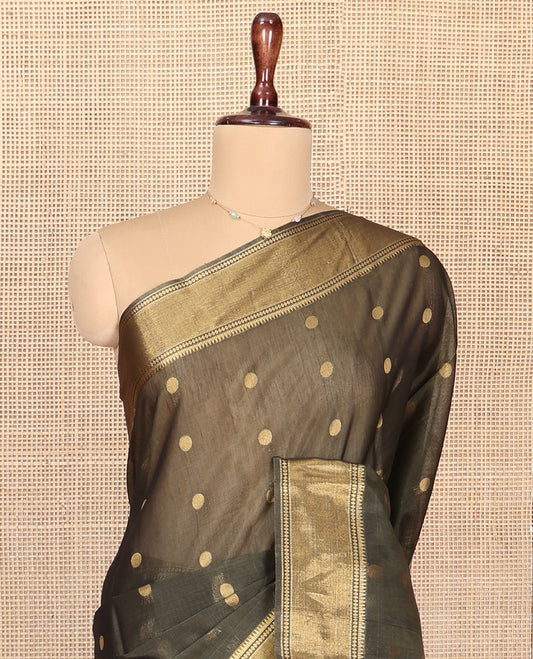 Green Silk Cotton Saree, Beautified with Zari Buttas All Over Its Body, Highlighted by Traditional Zari Border, Diagonally Woven Pallu and Paired With a Matching Blouse