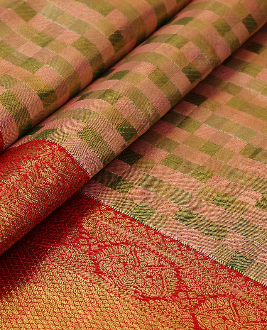 Peach checked silk saree, contrast border of thilakam mokku,muthu,banaras,floral,mayil kann & cross kamalam & jaal pallu