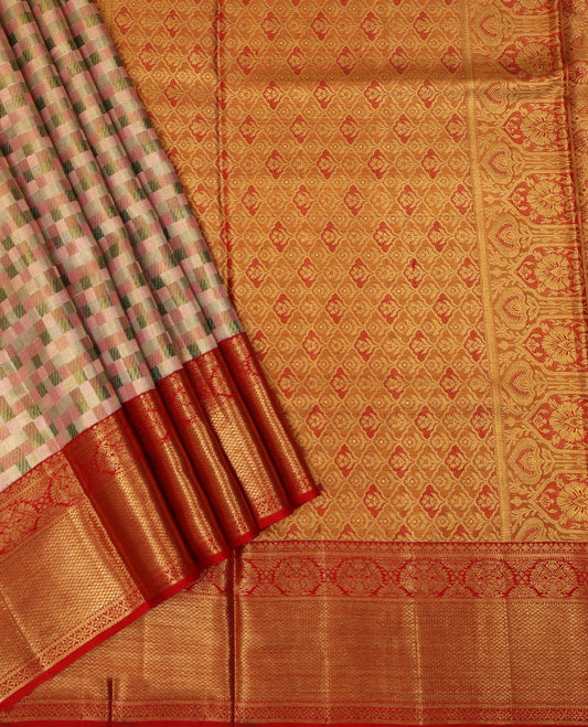 Peach checked silk saree, contrast border of thilakam mokku,muthu,banaras,floral,mayil kann & cross kamalam & jaal pallu