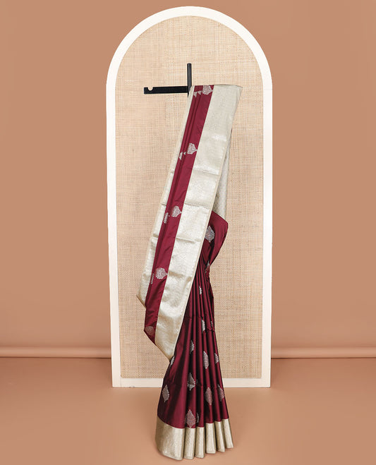 Maroon zari buttas soft silk saree, contrast traditional zari design border, and pallu of jaal design
