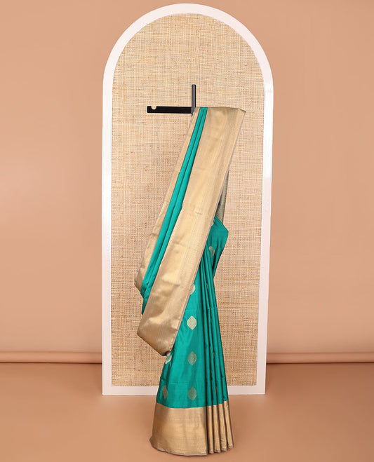 Green leaf design semi soft silk saree with contrast floral design border & jaal design pallu