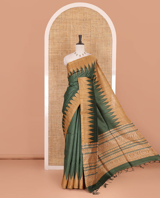 Green plain tussar silk saree, contrast temple border, and ikkat design pallu