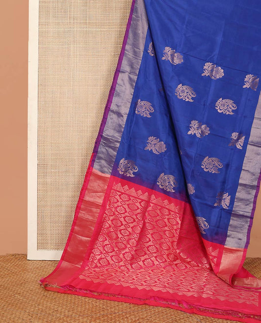 Royal blue zari buttas Uppada saree, contrast bavanji border, and jaal design pallu