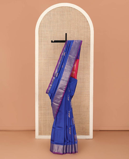 Royal blue zari buttas Uppada saree, contrast bavanji border, and jaal design pallu