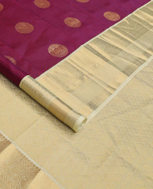 Maroon zari buttas Vasundhara silk mix saree, contrast border of thilakam, muthu, diamond, neli, and mayil designs, and jaal pallu