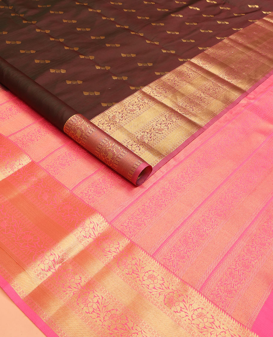 Brown Vasundhara Lite Silk Mix Saree Spotlighted with Zari Buttas, Featuring a Contrasting Zari-Woven Border with Rekku, Muthu, Kathir, and Kodi Visiry Designs, a Delicately Woven Pallu with Kodi Visiry Design, Paired with a Contrast Blouse