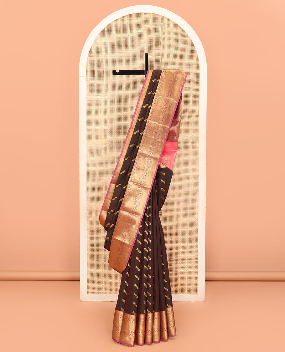 Brown Vasundhara Lite Silk Mix Saree Spotlighted with Zari Buttas, Featuring a Contrasting Zari-Woven Border with Rekku, Muthu, Kathir, and Kodi Visiry Designs, a Delicately Woven Pallu with Kodi Visiry Design, Paired with a Contrast Blouse