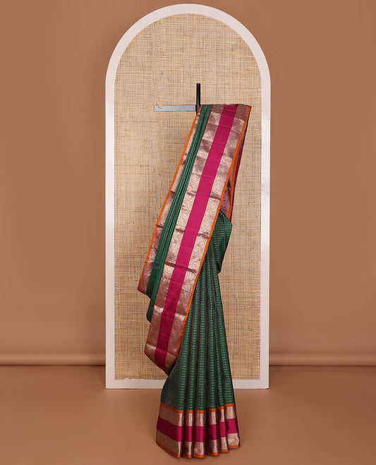 Green muthu kattam silksaree, contrast border of rekku,banaras,kodi mayail & mayil kann & pallu of grand jaal design