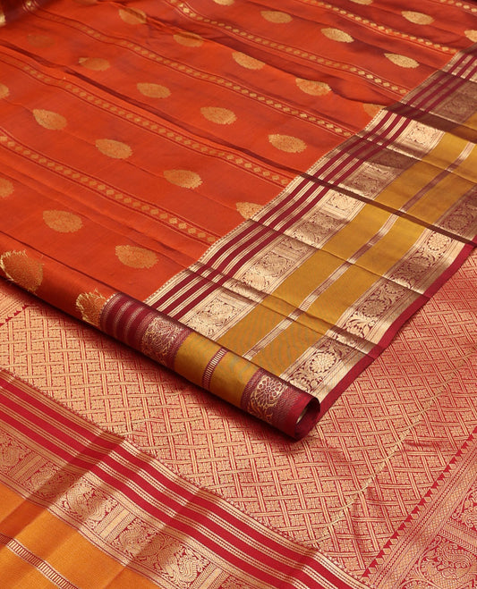 Orange zari buttas silk saree, contrast rettai pettu border of banaras,neli,mayil kann,mayil & kodi visiry designs & pallu of jaal design