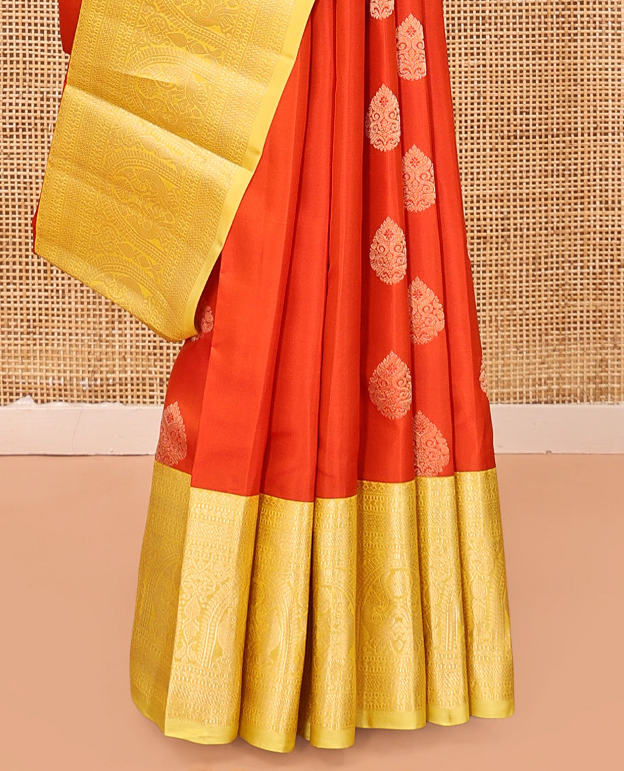 Orange Zari Buttas Vasundhara Silk Saree, Complemented by a Contrast Traditional Border of Mayil Designs, Sparsely Threaded Pallu, and a Contrast Blouse